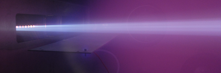 Ion implantation apparatus directing high-energy ions into a semiconductor wafer to modify its electrical properties.